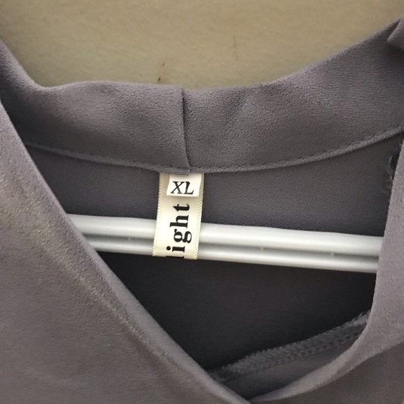 Grey camisole. Size XL. Never been worn before. Bought from eclipse. - Picture 2 of 2